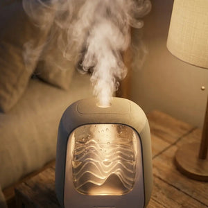 Humidifier emitting steam on a wooden table with warm ambient lighting